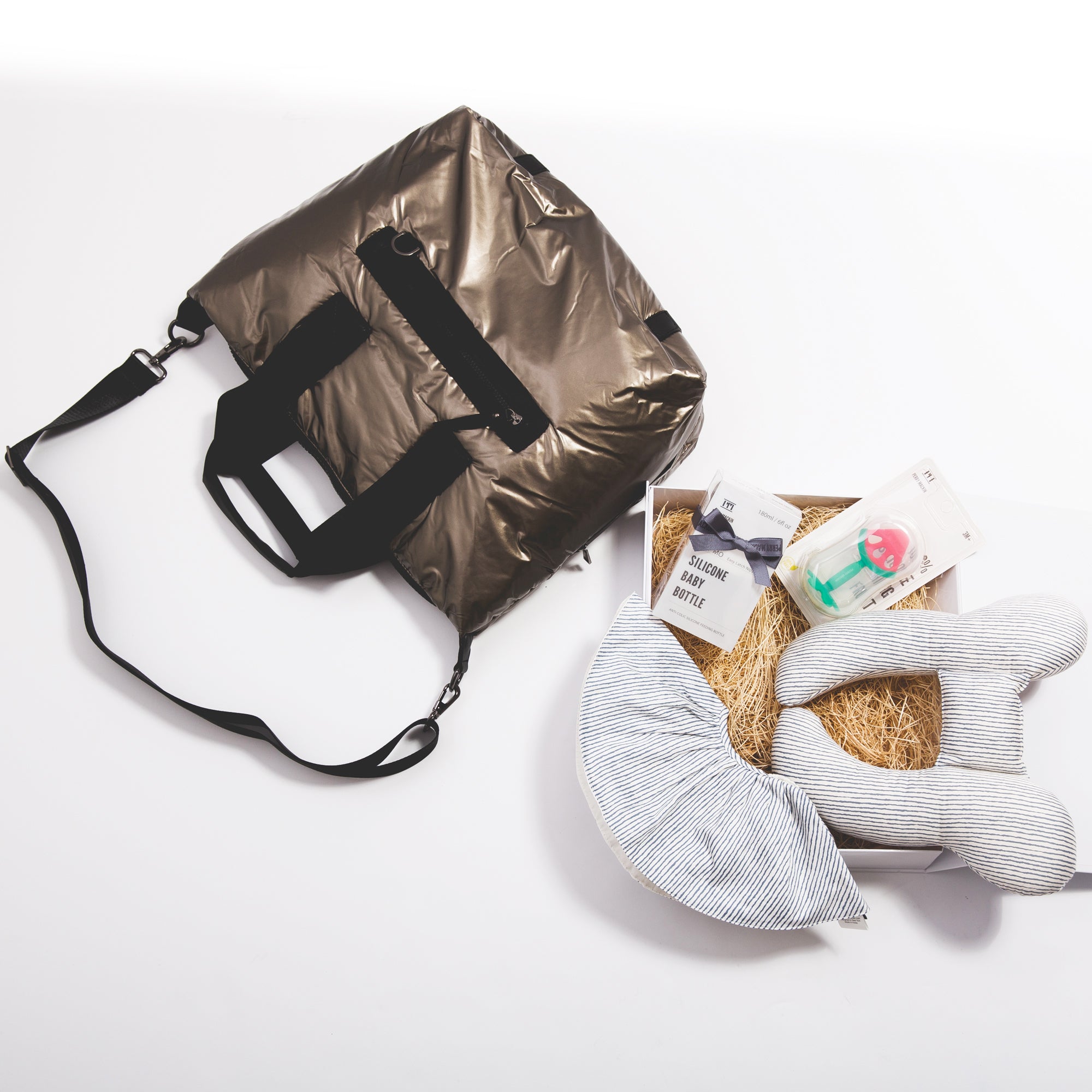 Diaper bag with baby pillow, bib, teether